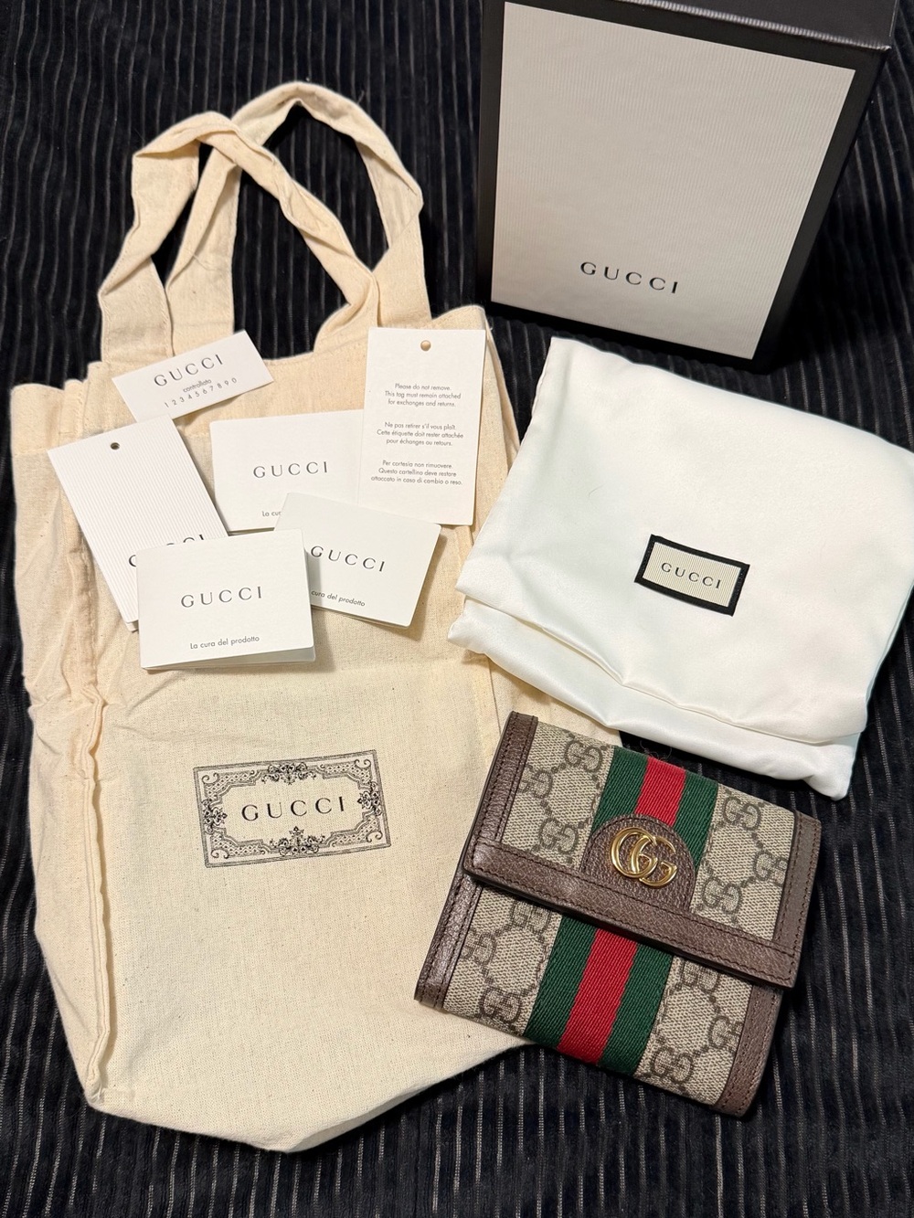 Gucci Brown GG Supreme Wallet with Gold Hardware